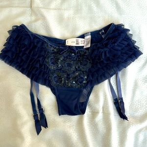 Gorgeous Victoria’s Secret garter belt with sequins in front
